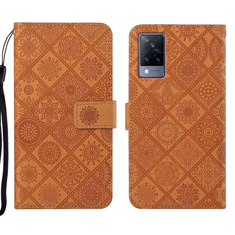 Brown embossed pattern leather phone case with folio cover and wrist strap