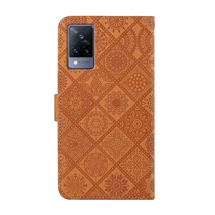 Tan embossed leather phone case with camera cutout and slim folio profile