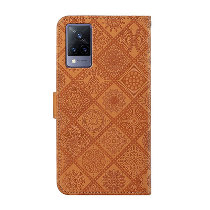 Tan embossed leather phone case with camera cutout and slim folio profile