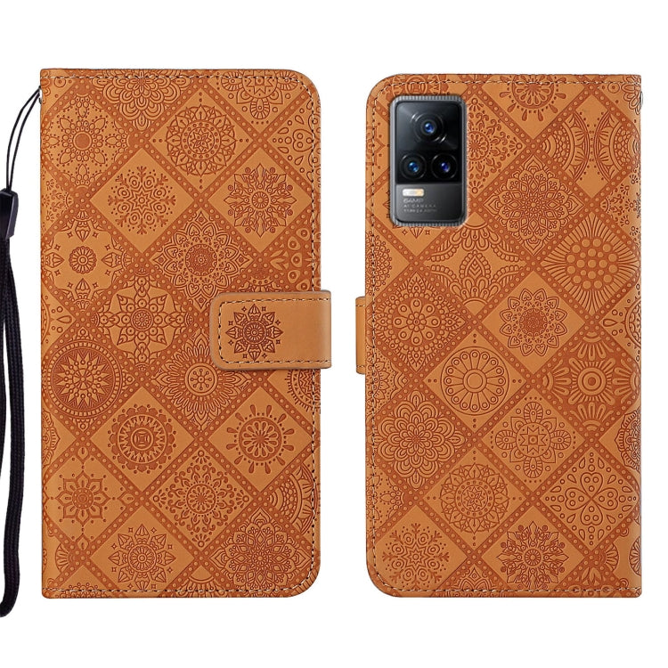 Brown embossed pattern leather phone case with folio cover and wrist strap