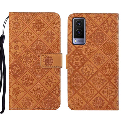 Brown embossed folio leather phone case, front cover and back camera opening shown