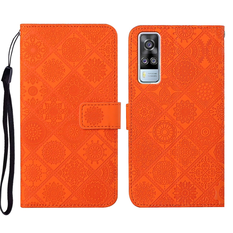 Orange embossed pattern leather-style folio phone case with wrist strap; front flap and rear camera cutout