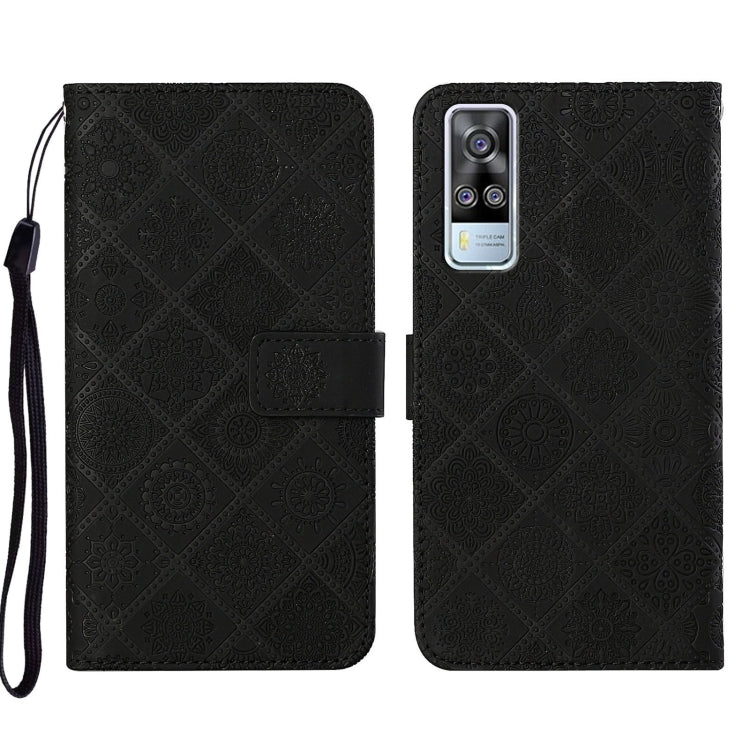 Black embossed pattern leather-style folio phone case with wrist strap; card slot and rear camera window