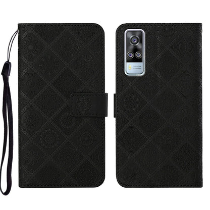 Black embossed pattern leather-style folio phone case with wrist strap; card slot and rear camera window