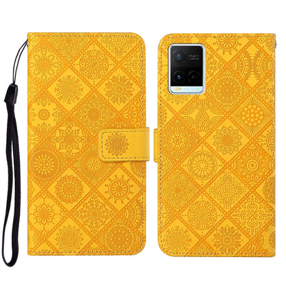 Yellow embossed pattern leather-style folio phone case with wrist strap; front flap and rear camera cutout