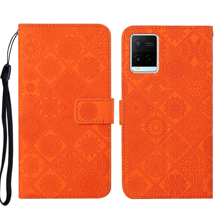 Orange embossed pattern leather-style folio phone case with wrist strap; folio closure and rear camera cutout