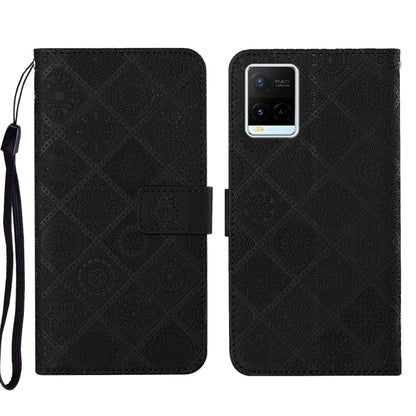 Black embossed leather folio phone case with wrist strap, magnetic flap and card pocket.