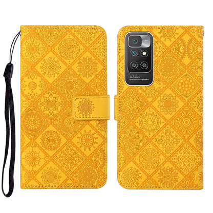 Yellow embossed leather wallet phone case with floral pattern and side wrist strap