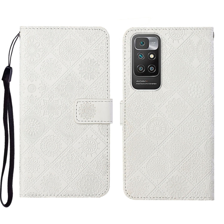 White embossed leather phone case wallet with flip cover and wrist strap.