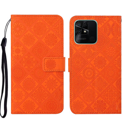 Folio leather phone case with embossed geometric pattern, orange, wrist strap