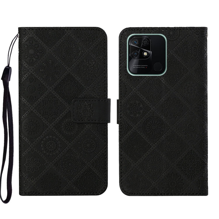 Black embossed leather phone case with folio flap and camera cutout, wrist strap
