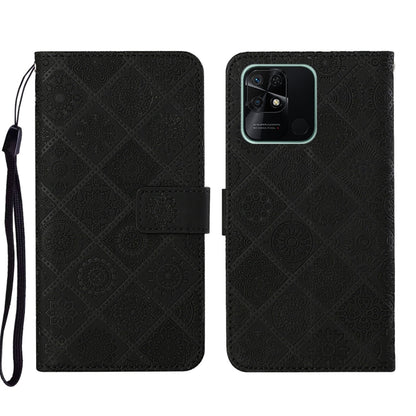Black embossed leather phone case with folio flap and camera cutout, wrist strap
