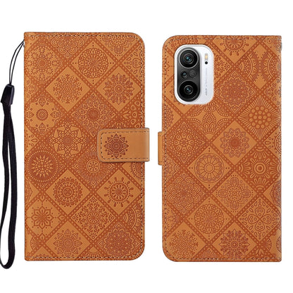Ethnic embossed leather phone case front and back with patterned design and camera openings