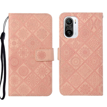 Dusty pink embossed geometric leather phone case with folio flap and wrist strap, camera cutout