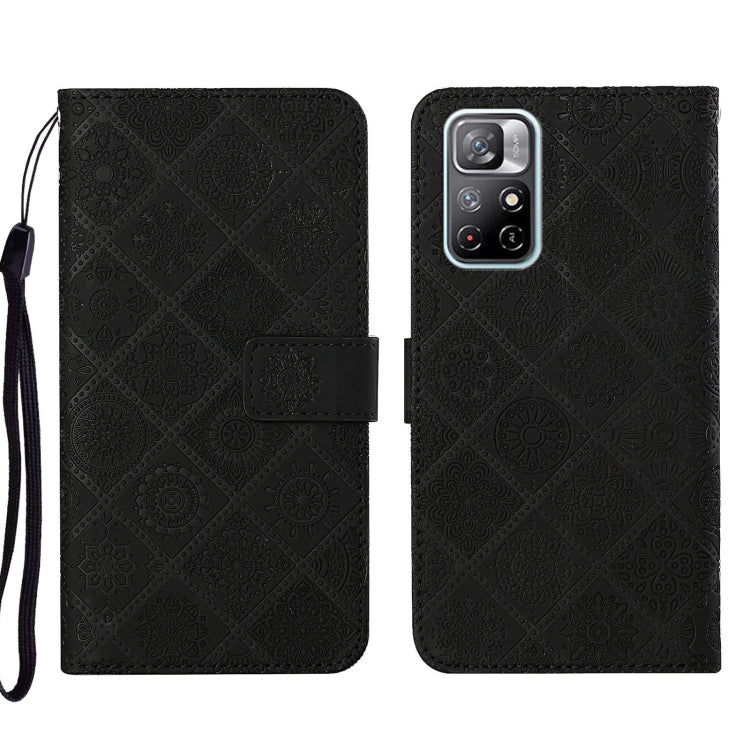 Black embossed leather phone case with folio flap and textured pattern, wrist strap