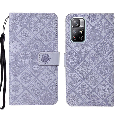Purple embossed pattern leather folio phone case with wrist strap and front flap pocket