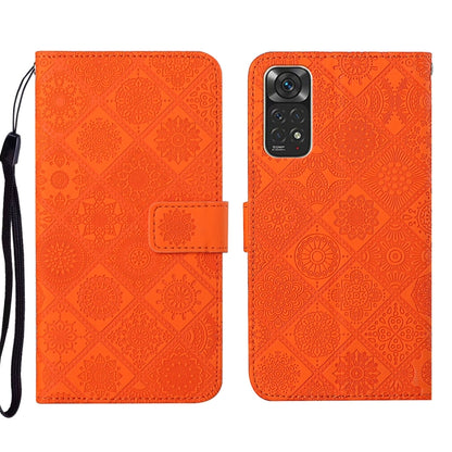 Orange embossed leather phone case with folio flap, card slot, and wrist strap