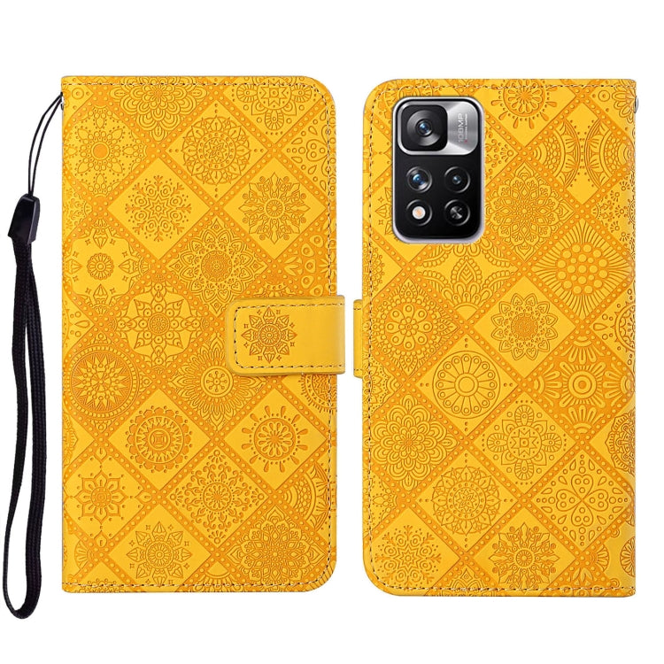 Folio leather phone case with embossed geometric pattern, yellow-gold, wrist strap