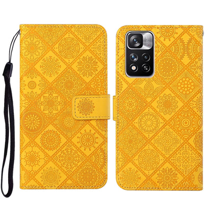 Folio leather phone case with embossed geometric pattern, yellow-gold, wrist strap