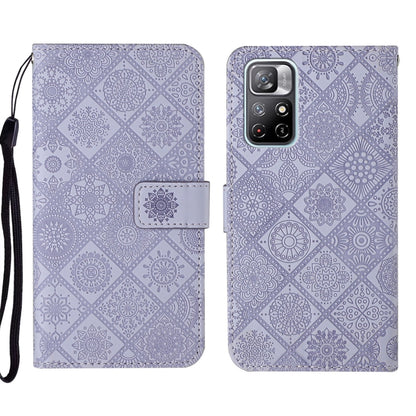 Lavender embossed geometric wallet phone case, showing cutouts and back camera window