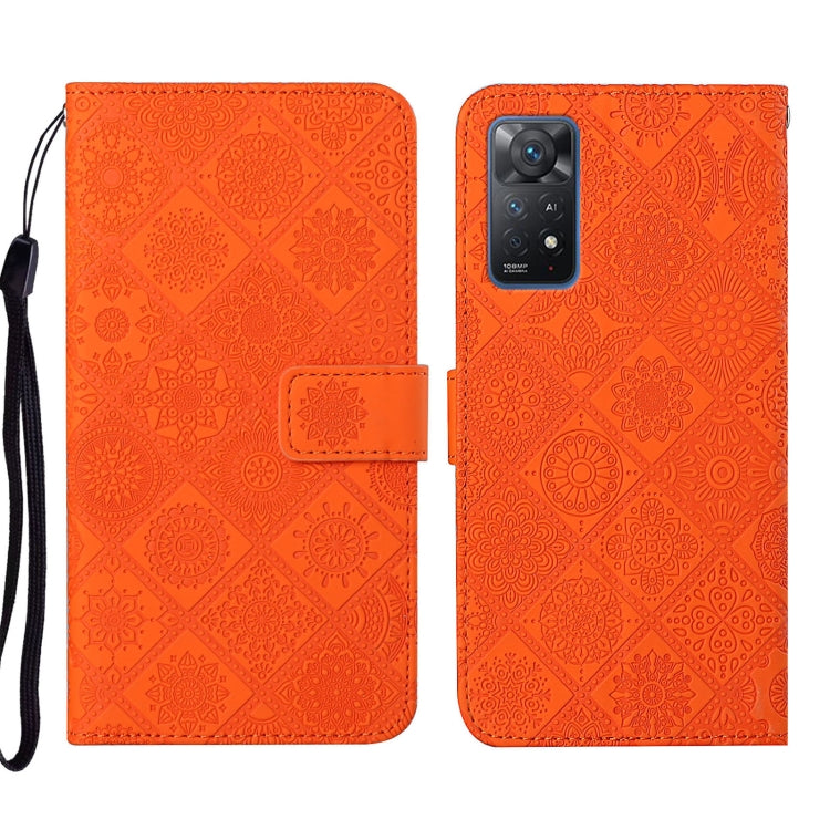 Orange embossed leather phone case with folio flap, card slot, and camera cutout