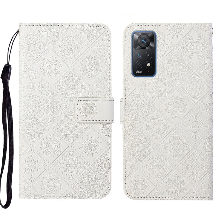 White embossed pattern leather folio phone case with wrist strap and front flap pocket