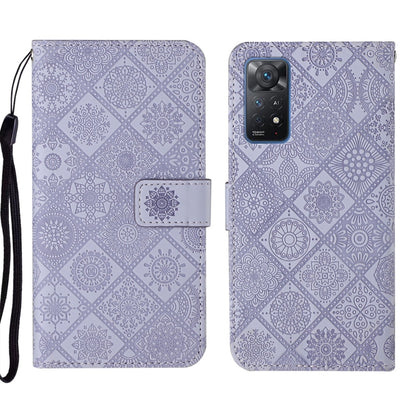 Lavender embossed geometric wallet phone case with fold-over flap and wrist strap, front view
