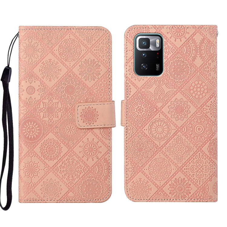 Pink embossed leather wallet phone case with floral pattern and magnetic flap