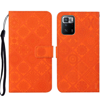 Orange embossed leather phone case with folio flap and textured pattern, wrist strap