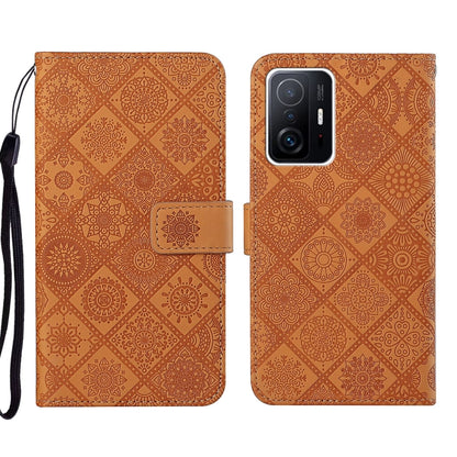 Cinnamon brown embossed geometric leather phone case with folio flap and wrist strap, camera cutout