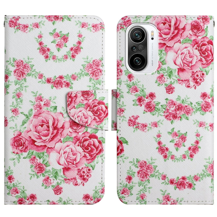 Flip leather phone case with pink rose and green floral pattern, snap closure.