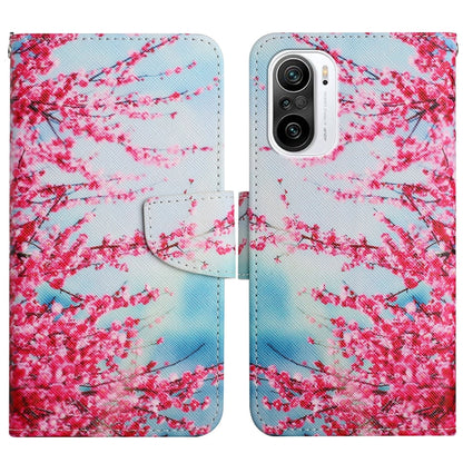 Flip leather phone case with pink blossoms and blue gradient pattern