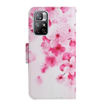 Flip leather phone case with pink blossom painted pattern, open camera cutout
