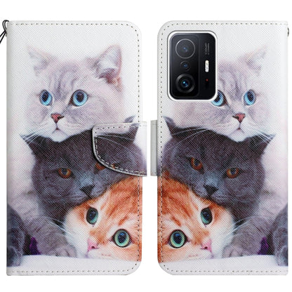 Flip leather phone case with cat faces collage in white, orange, and black