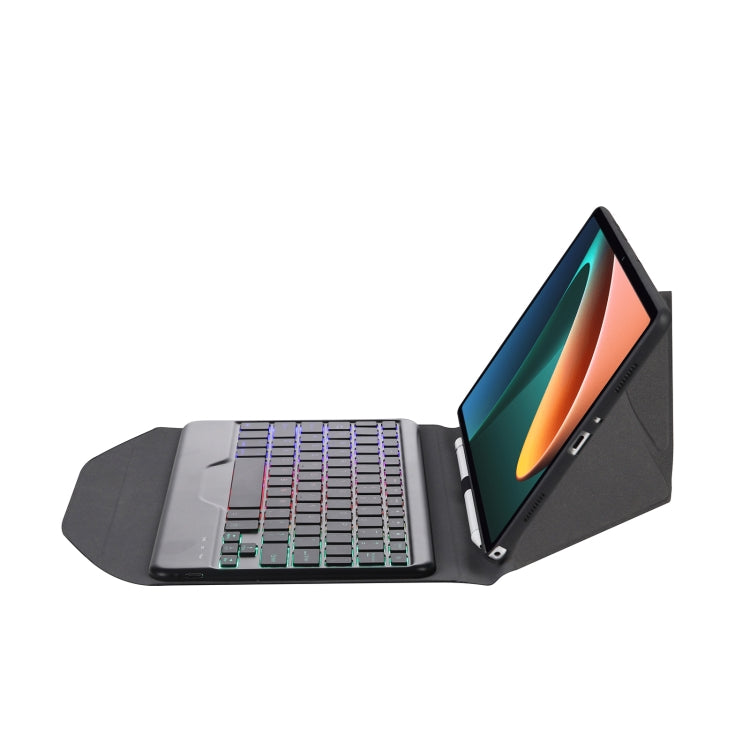 Bluetooth keyboard leather case open, side view of backlit keys and device stand hinge