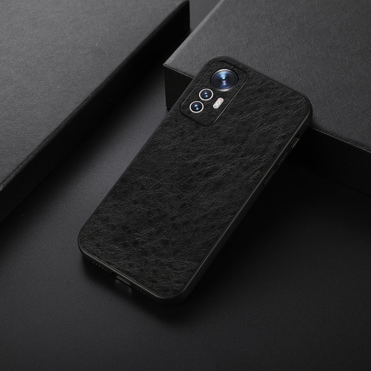 Black crazy-horse PU phone case, angled view, with camera cutout and side openings
