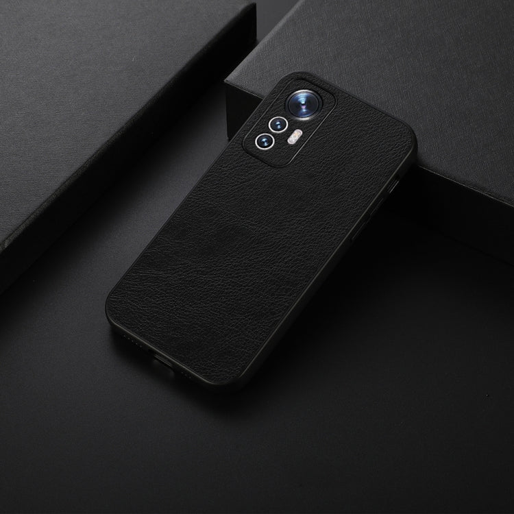 Black litchi-texture PU phone case with camera cutout, angled view