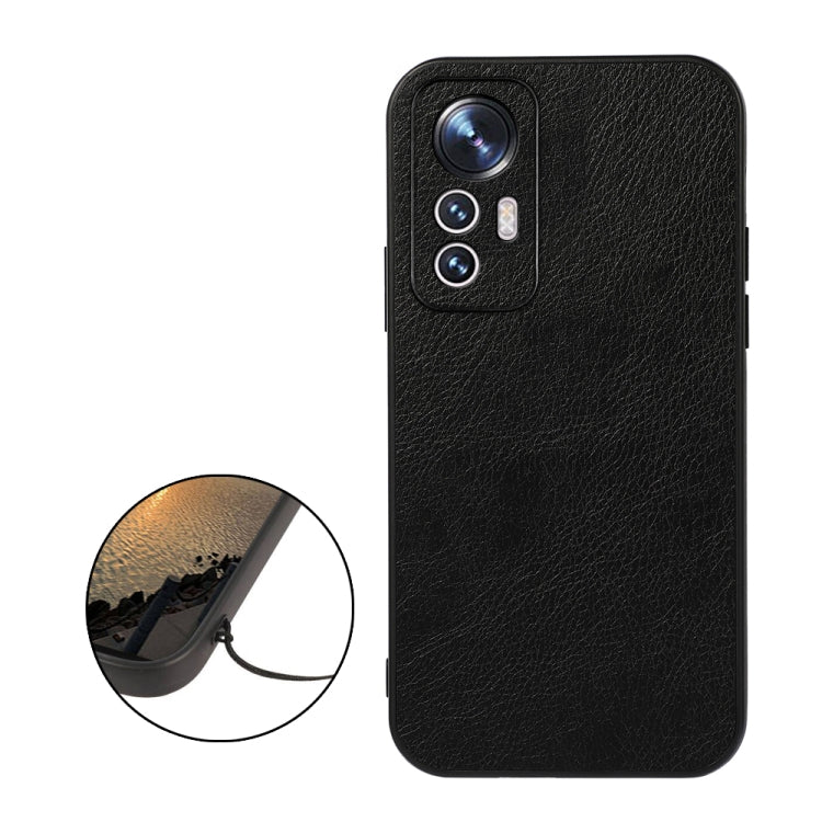 Black litchi-texture PU phone case with camera cutout and raised lip