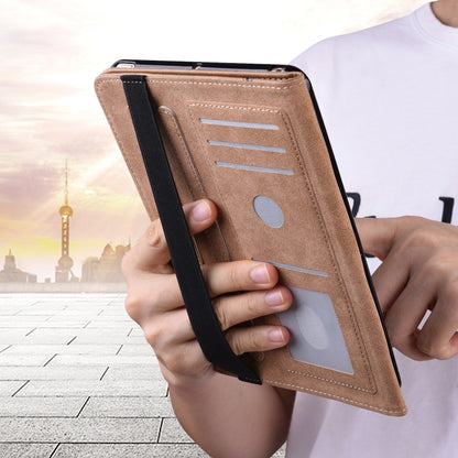 Tan tablet case folio with card slot pocket and hand holding upright cover