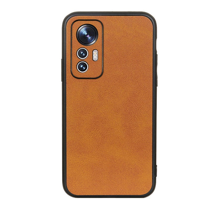 Orange calf-texture PU phone case with camera cutout and side port openings