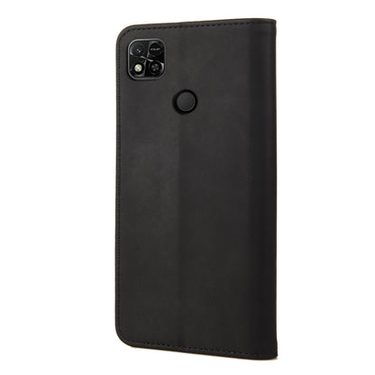 Black leather folio phone case with camera cutout and round magnetic closure