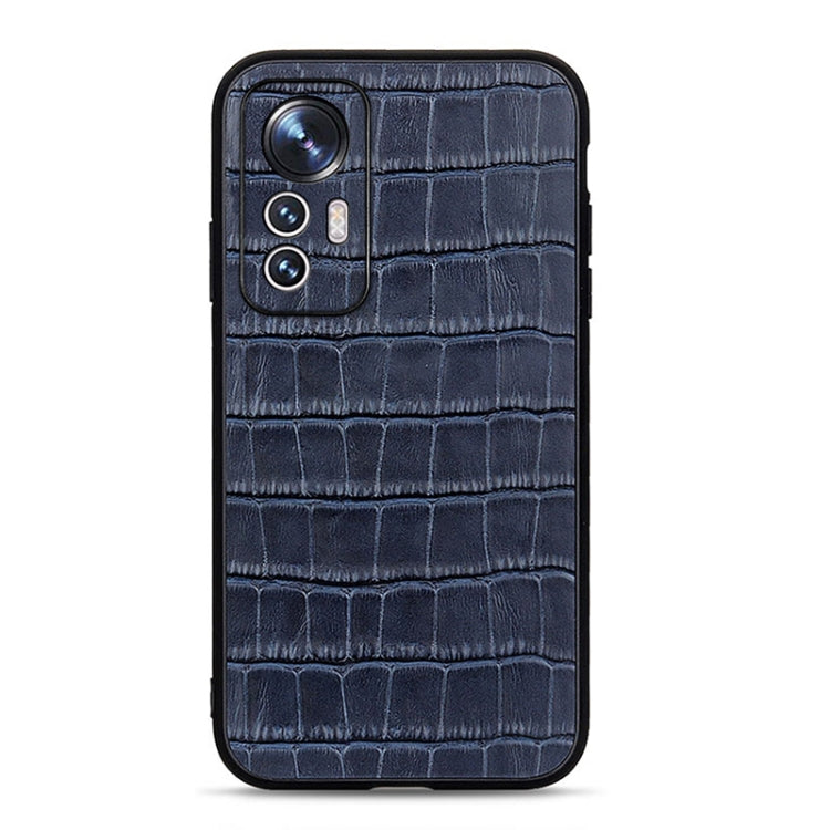 Blue croc-textured genuine leather phone case with camera openings and cutout edges
