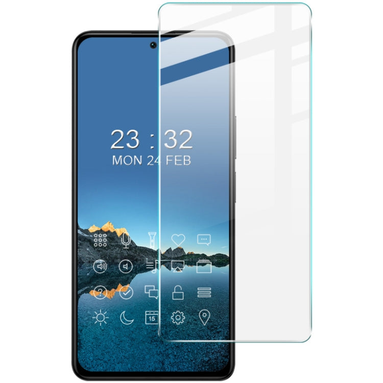 Tempered glass screen protector film applied on a smartphone display
