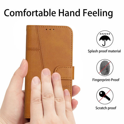 Tan leather phone case with side buckle and stitched texture, shown in hand