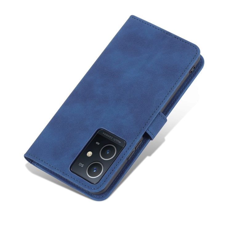 Blue leather folio phone case with side cutouts and flip closure strap