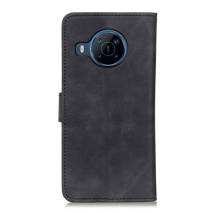 Black leather phone wallet case with camera cutout on back cover