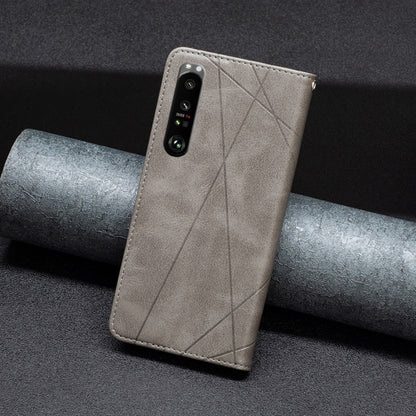 Light gray leather phone case with geometric diagonal stitching and camera cutout, magnetic flap.