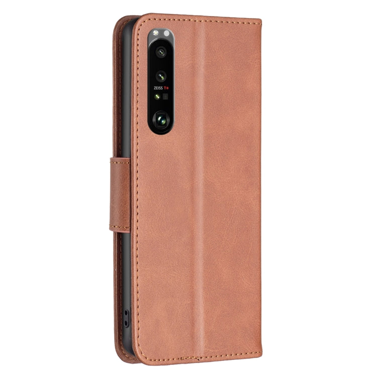 Brown leather phone case with camera cutout and side card slot