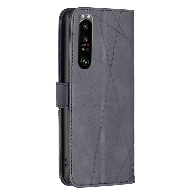 Dark gray leather wallet phone case with phone camera cutout and flip cover