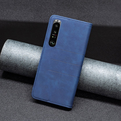 Blue magnetic leather phone case with camera cutout, back view